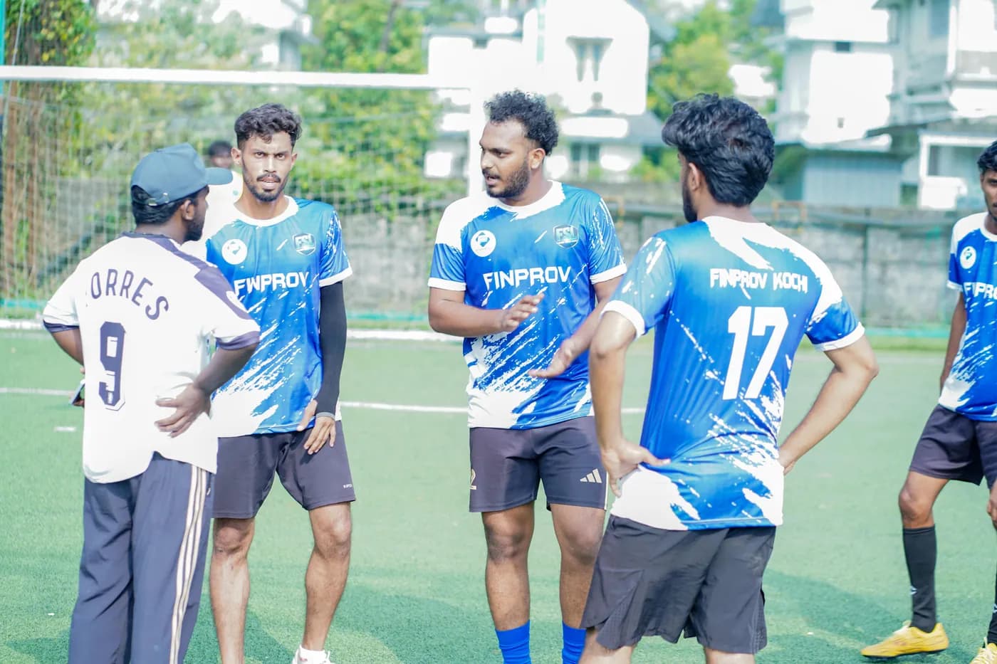 Finprov football team posing on the field