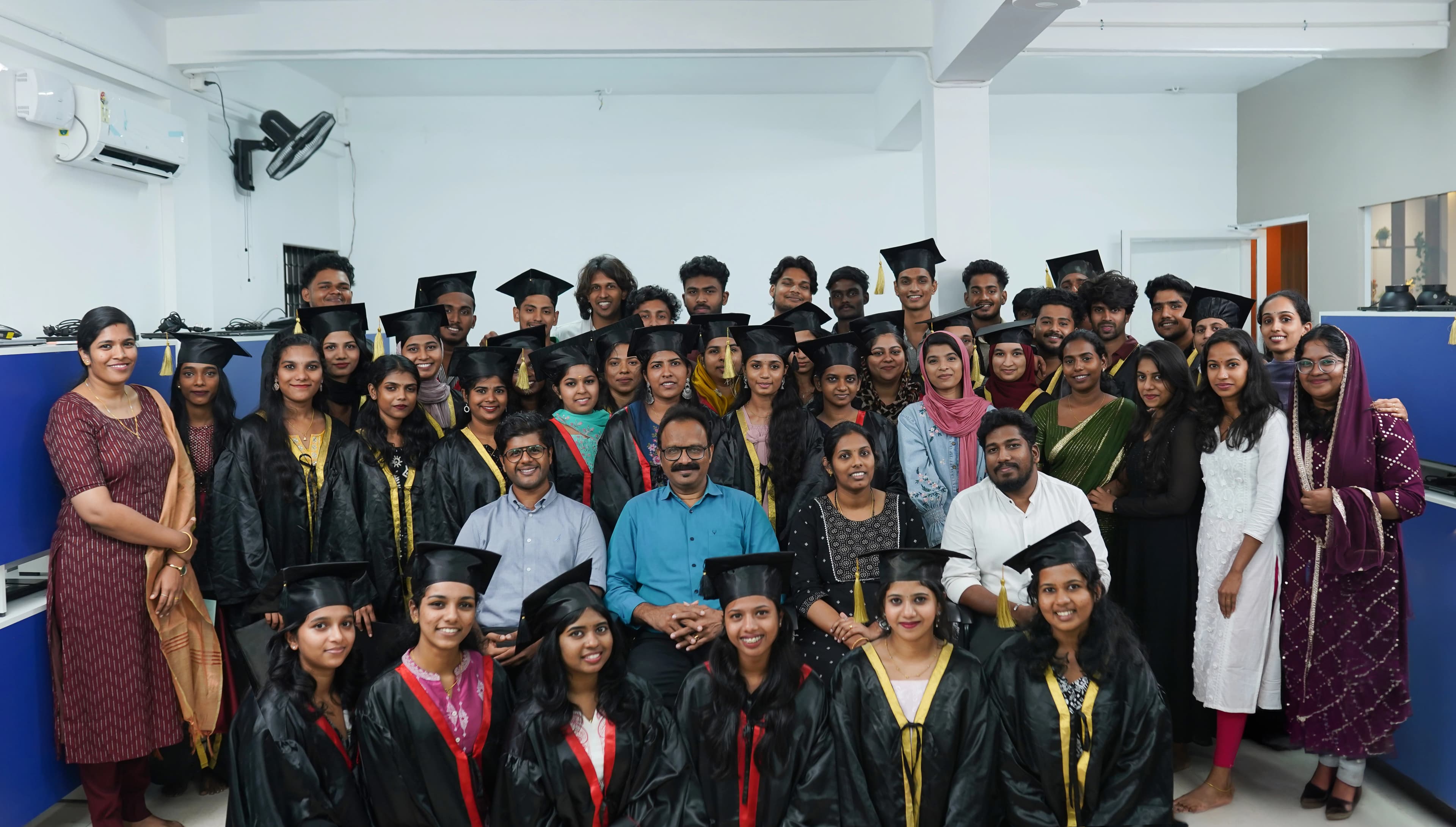 Finprov graduates and faculty at a convocation