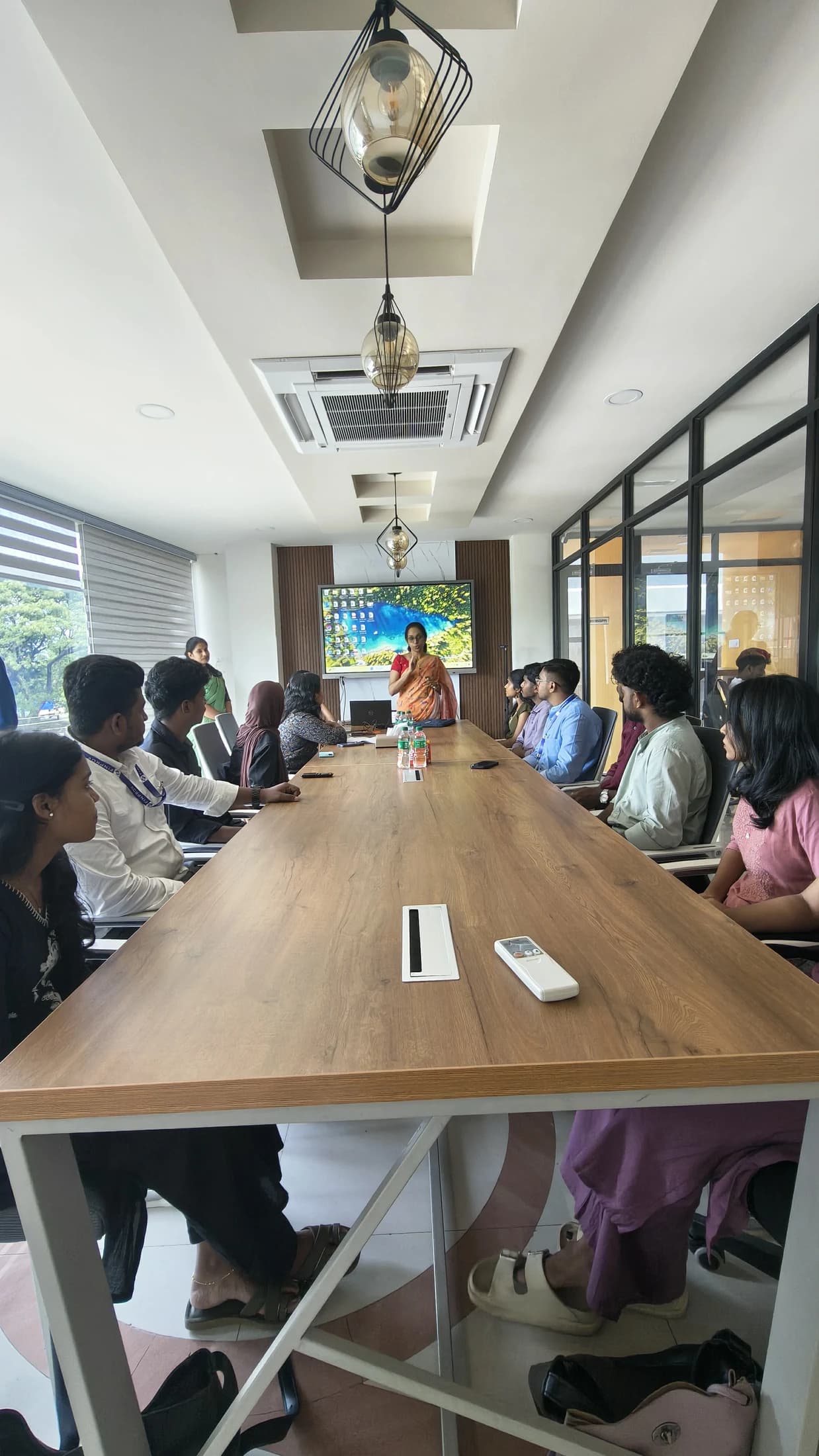 Finprov trainer leading a class in a conference room