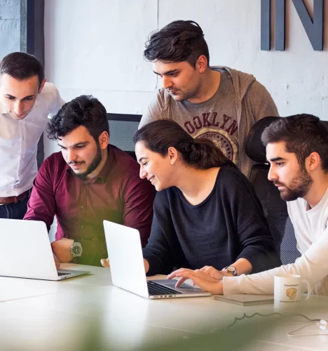 colleagues-working-project-discussing-details